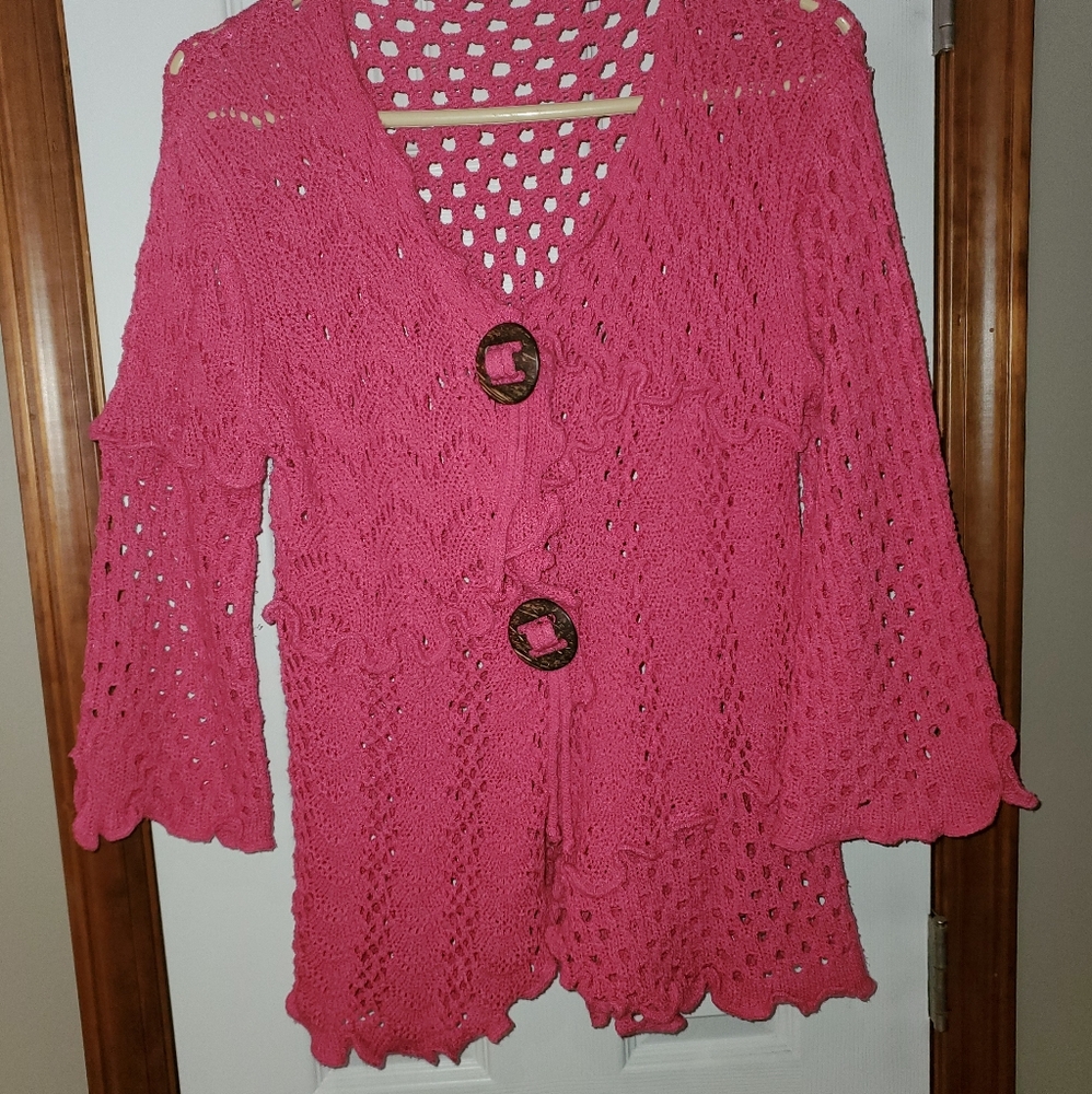 Cardigan Sweater with 2 buttons over snaps.